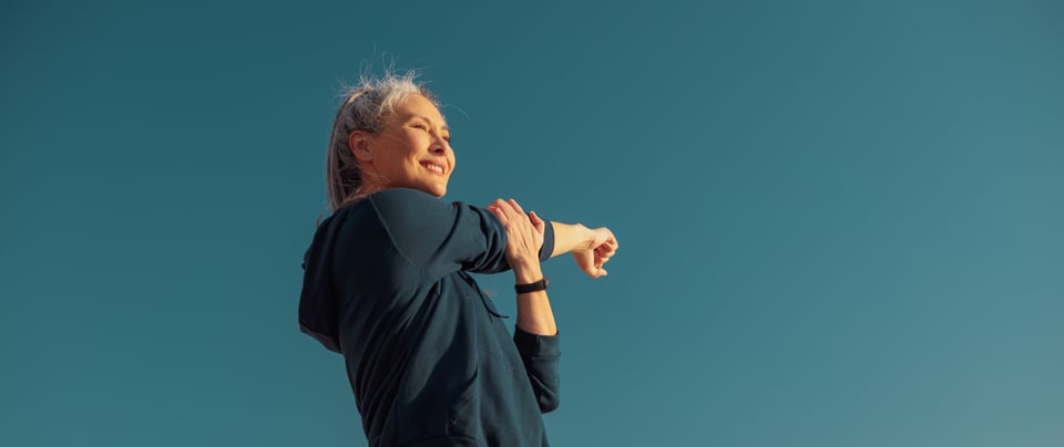 active-happy-woman-exercising-warm-day-by-coast