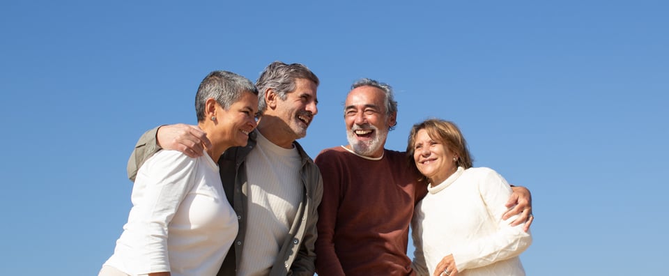 two-senior-couples-having-fun-outdoors-sunny-day-standing-against-blue-sky-laughing-happy-old-friends-enjoying-leisure-time-together-friendship-leisure-retirement-concept